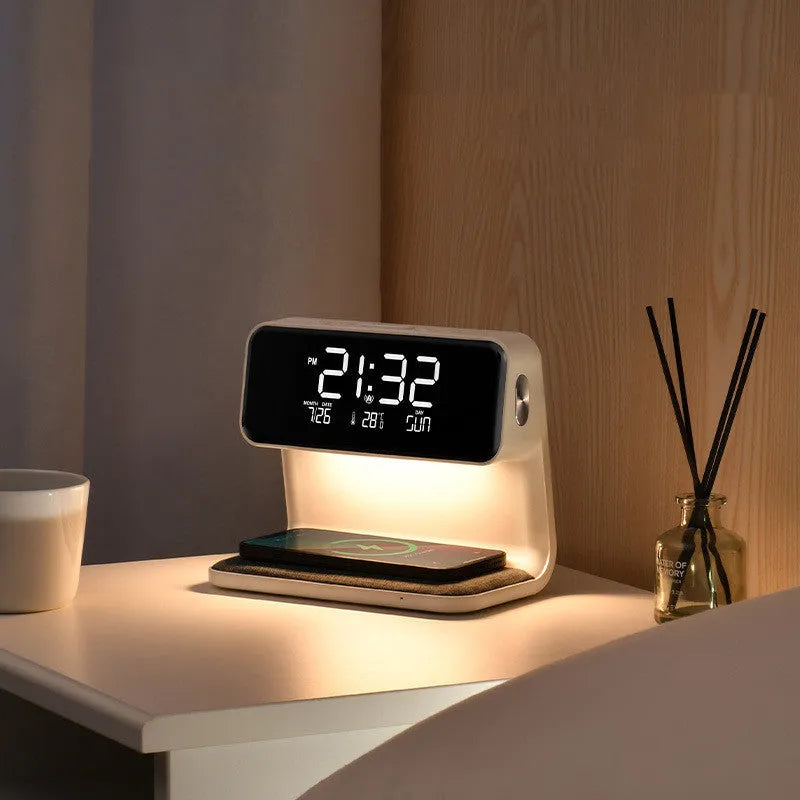 White bedside lamp with integrated wireless charging pad and LCD alarm clock display