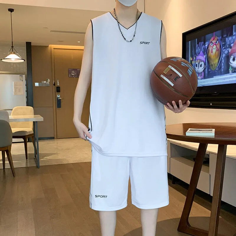 Light grey polyester basketball vest and shorts sports suit laid flat