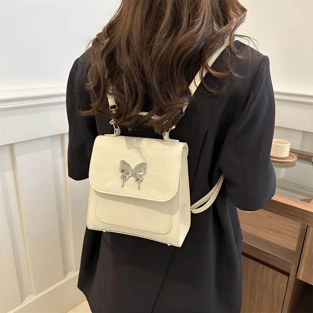 Women's PU leather backpack in multiple colours with bow detailing and hand-carrying option