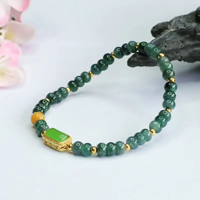 Natural stone blue water jade beaded bracelet for women with electroplated metal accents and geometric design