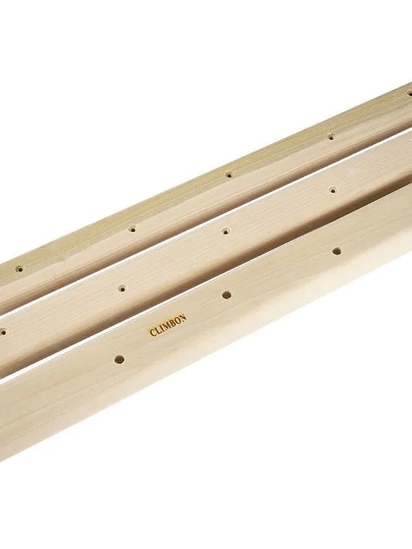 Set of three solid wood fingerboards for grip strength training in different lengths.