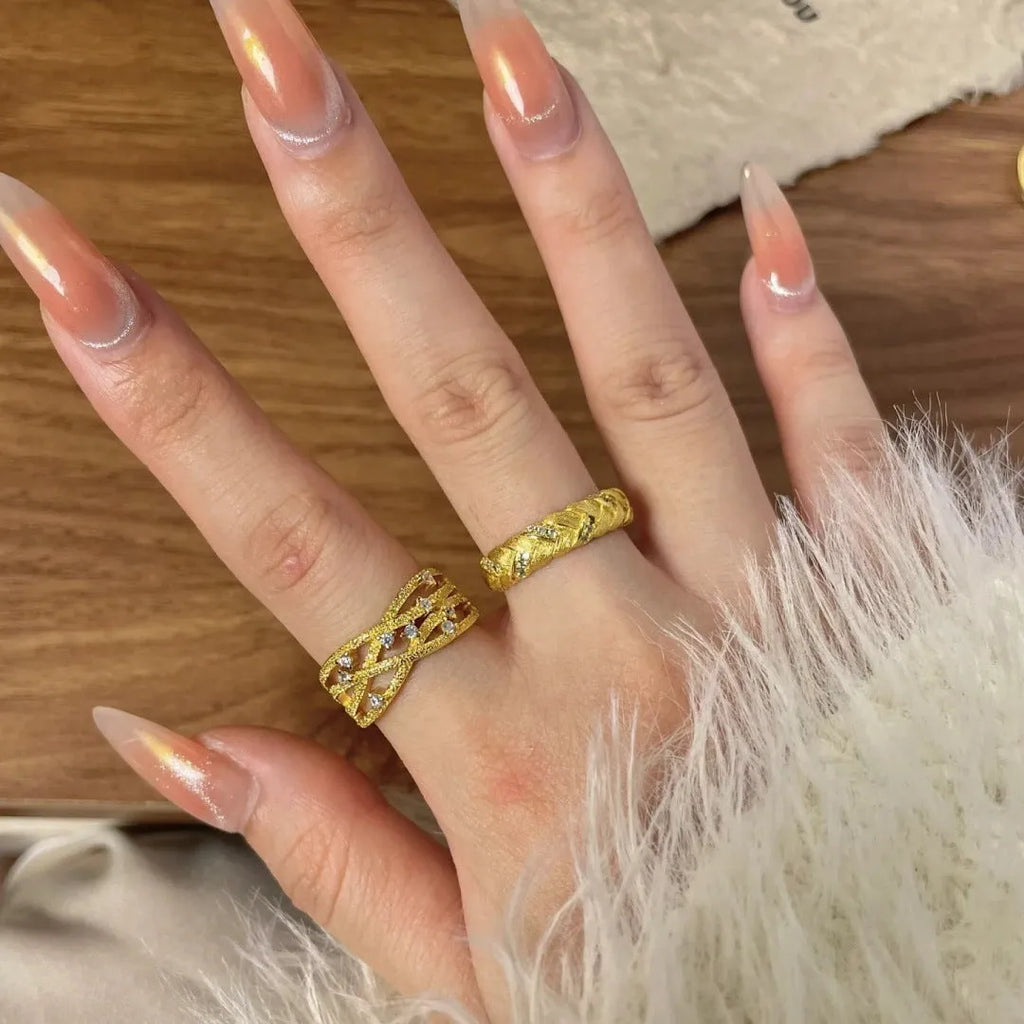 Women's adjustable copper ring with three-dimensional hollow vine cord design in gold electroplated finish
