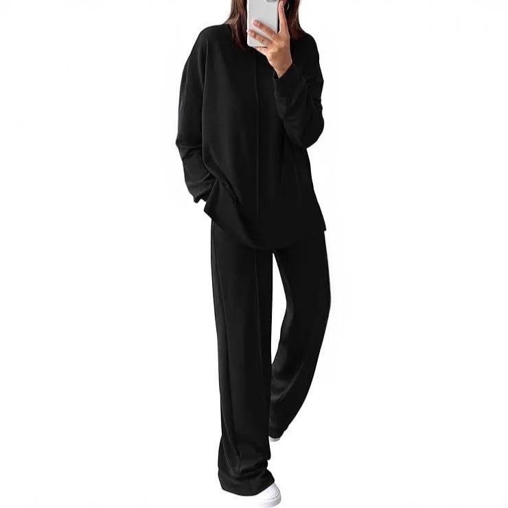 Women's long sleeve polyester jogging suit set in army green, shown as a top and trousers.