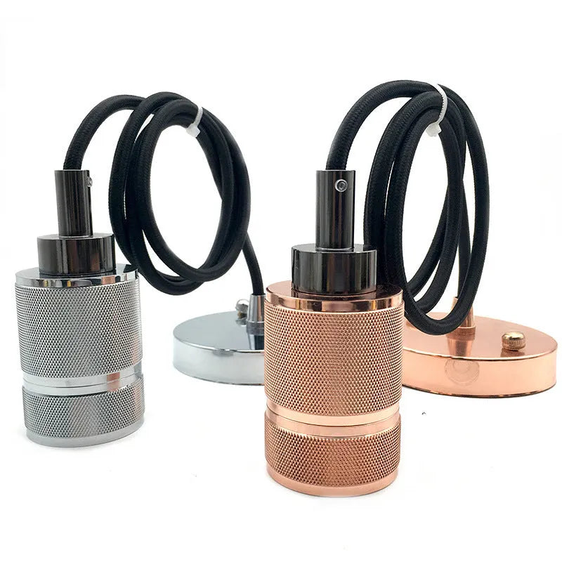 Components of a DIY retro ceiling light assembly kit in chrome finish, showing metal ceiling rose, braided cord, and lamp holder.