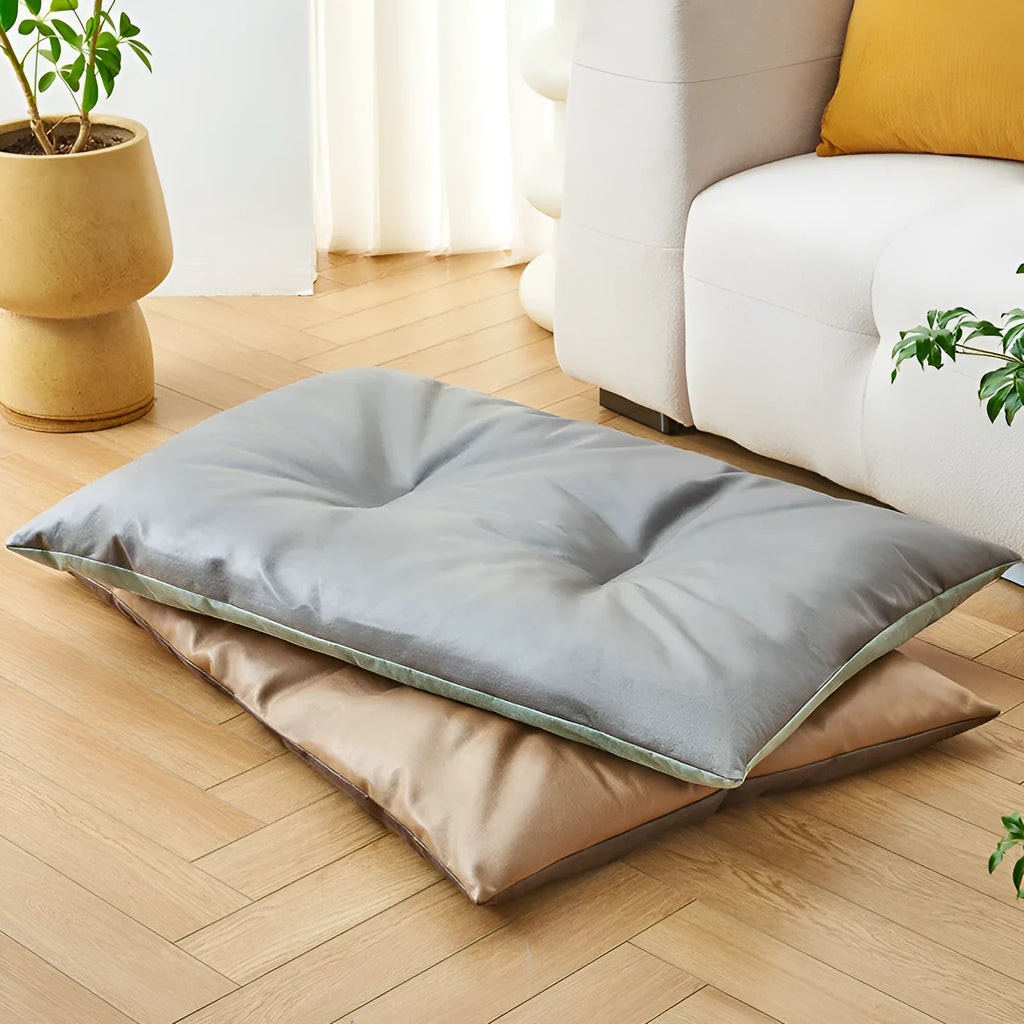 Blue cooling pet bed for cat or small dog showing lightweight foam construction and size scale.