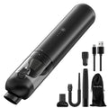 Black handheld wireless cleaner with attachments on a table, 70W rechargeable dust blower for car and home use