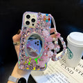 Pink diamond-encrusted mirror silicone phone case for Apple iPhone, reflective surface with crystal pattern