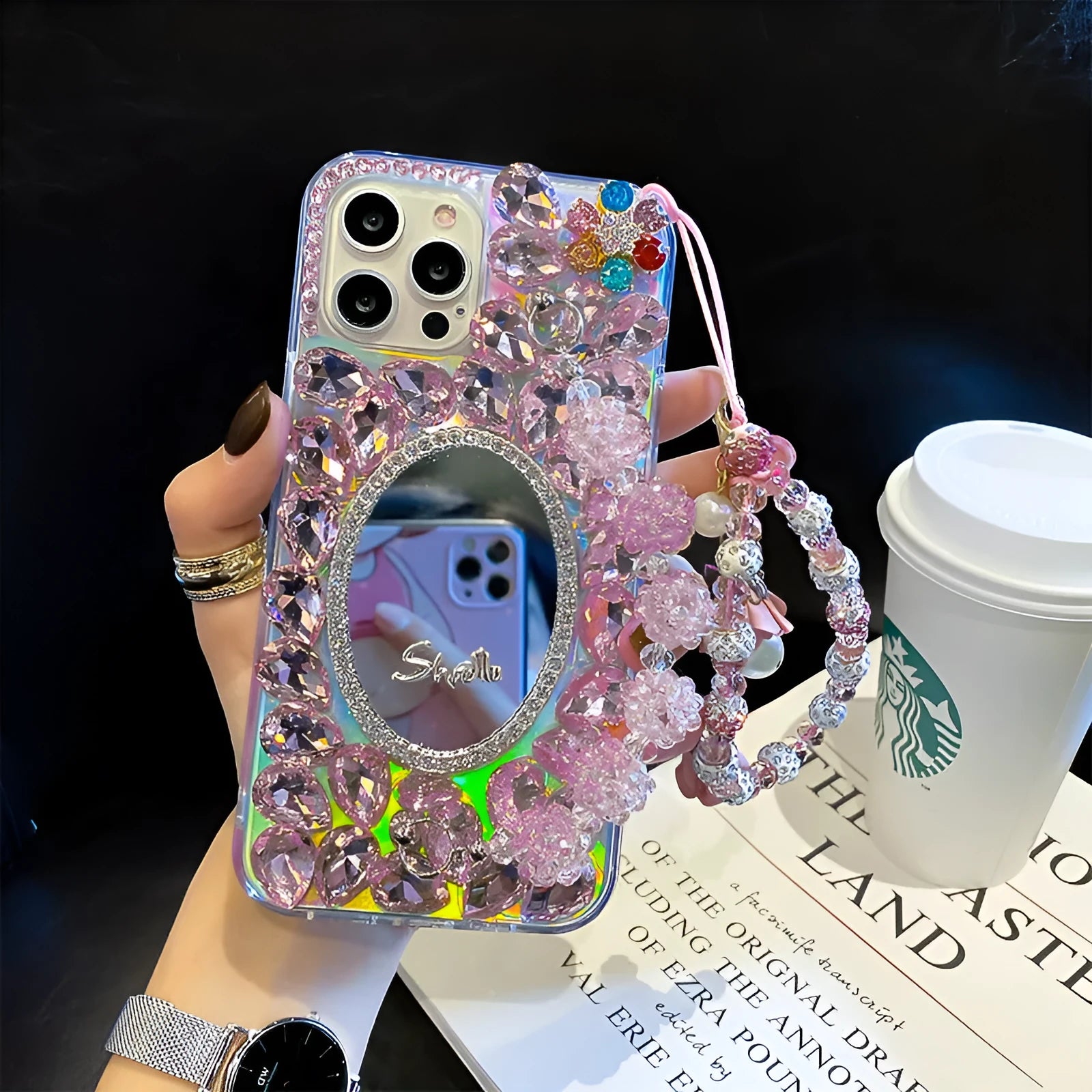 Pink diamond-encrusted mirror silicone phone case for Apple iPhone, reflective surface with crystal pattern