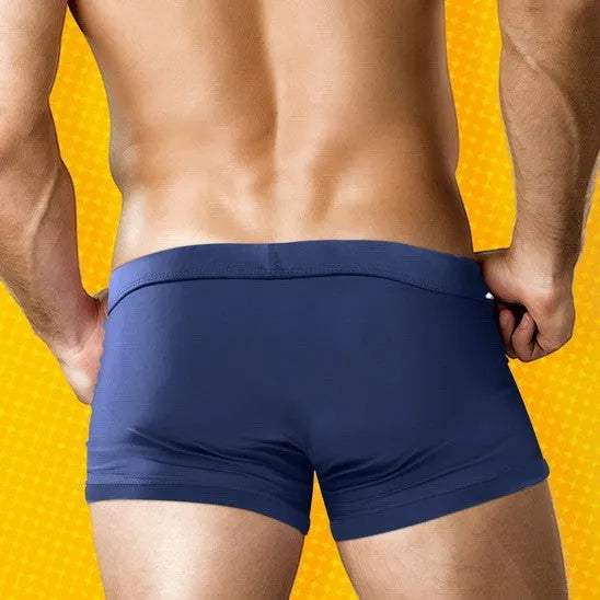 Men's polyester boxer shorts with front and back zipper pockets in multiple colours, sizes S to XL.