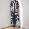 Black women's cardigan and trousers set with cartoon animation print