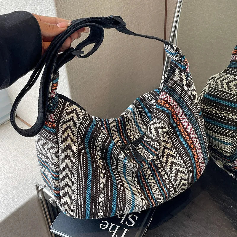 Women's ethnic style dumpling-shaped crossbody bag in canvas material with decorative sewing details
