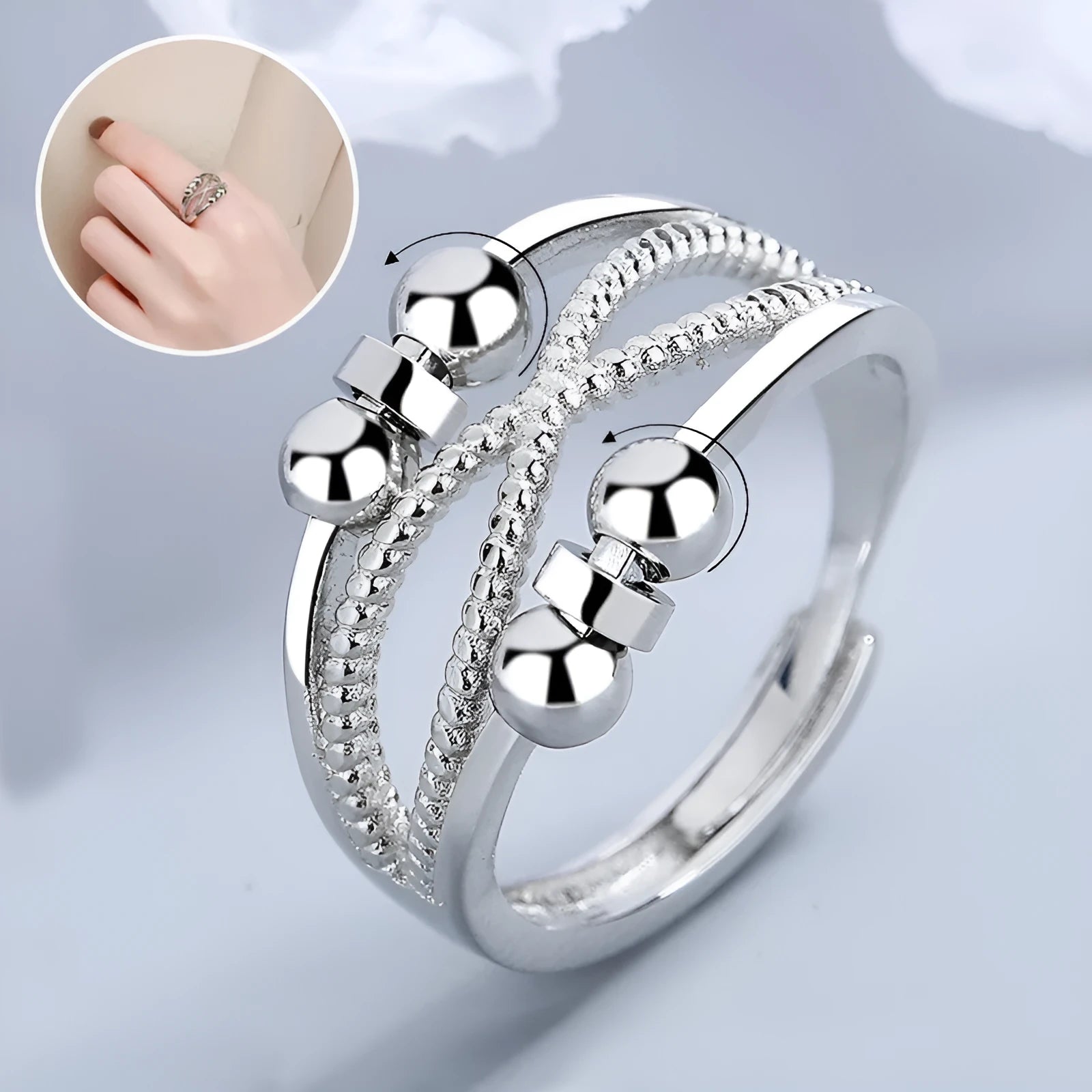 Rotatable copper ring with open design double-layered hollow line construction in platinum colour geometric shape
