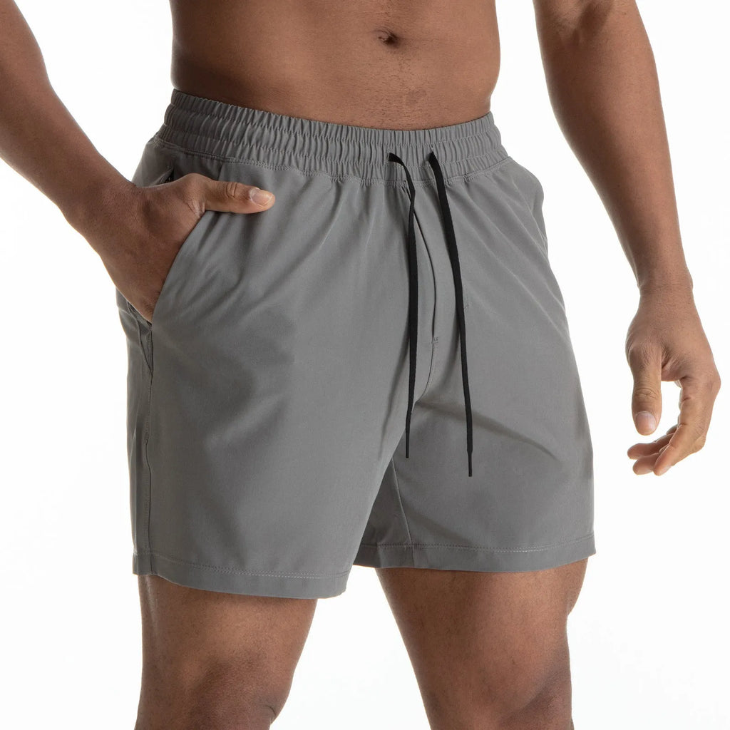 Men's black quick-dry exercise shorts with mesh stitching detail