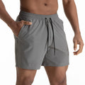 Men's black quick-dry exercise shorts with mesh stitching detail