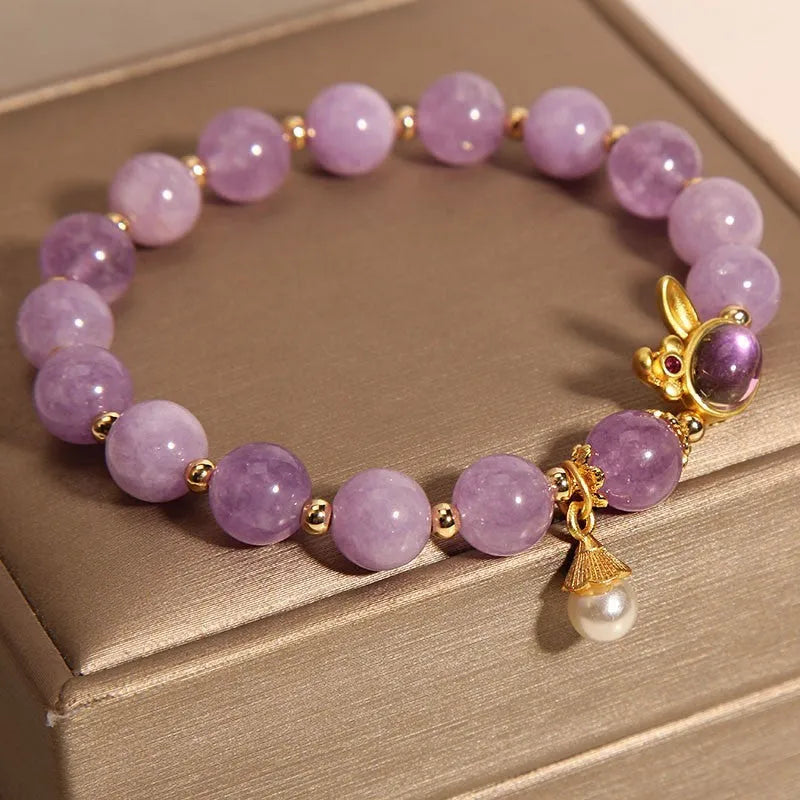 Mauve jade rabbit bracelet with crystal hare head design on adjustable wristband