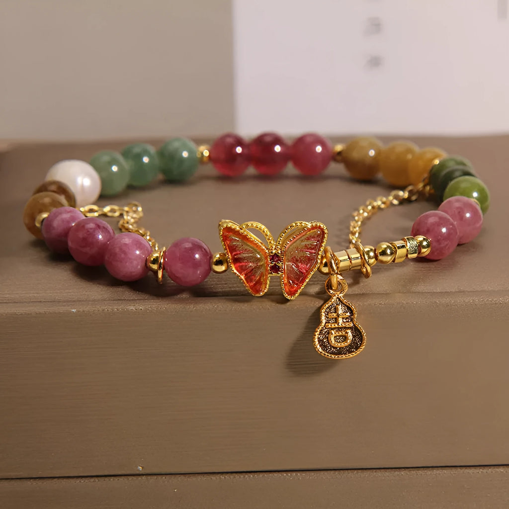 Natural jade coloured tourmaline butterfly agate bracelet for women showing pendant detail