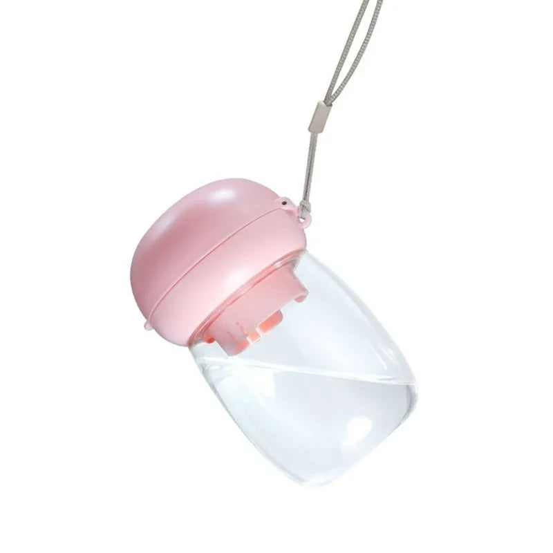 Portable dog water bottle with attached cup in white, 300ml capacity for walking and travel