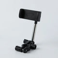 Black car mobile phone holder with adjustable rotation on dashboard