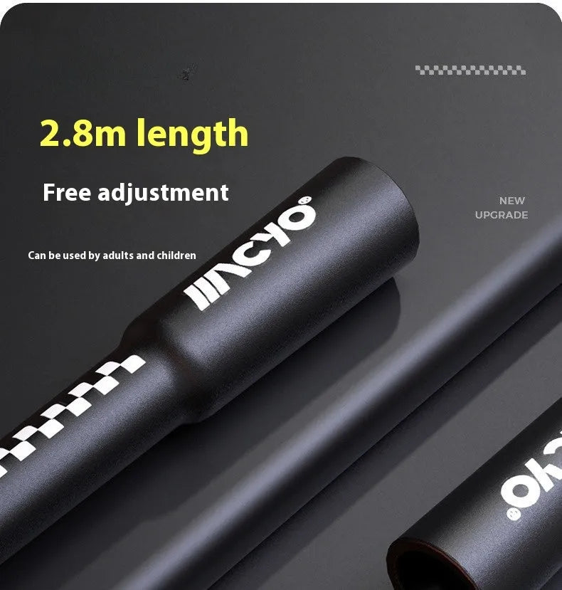 Colourful PVC fitness skipping rope for physical exercise on a plain background