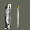 Industrial retro flute shaped iron wall lamp in an antique finish, shown mounted on a wall.