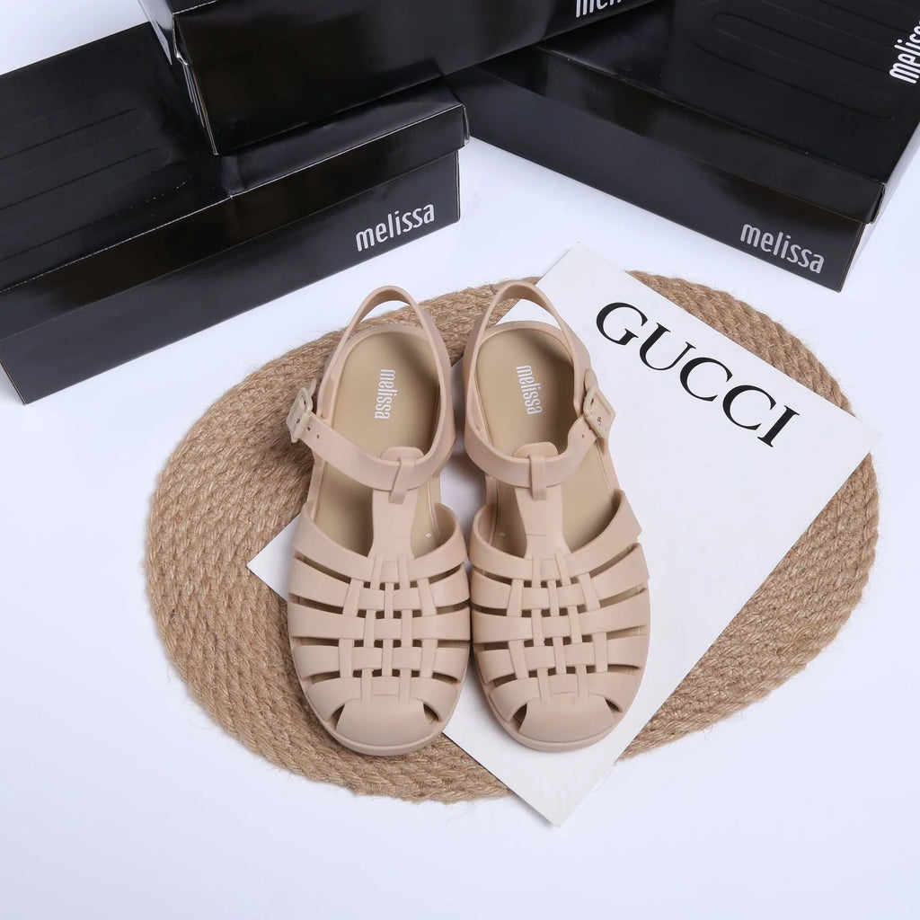 Matte black Vintage Weave Roman Shoes showing buckle fastening, hollow out design, and round toe shape