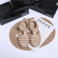 Matte black Vintage Weave Roman Shoes showing buckle fastening, hollow out design, and round toe shape