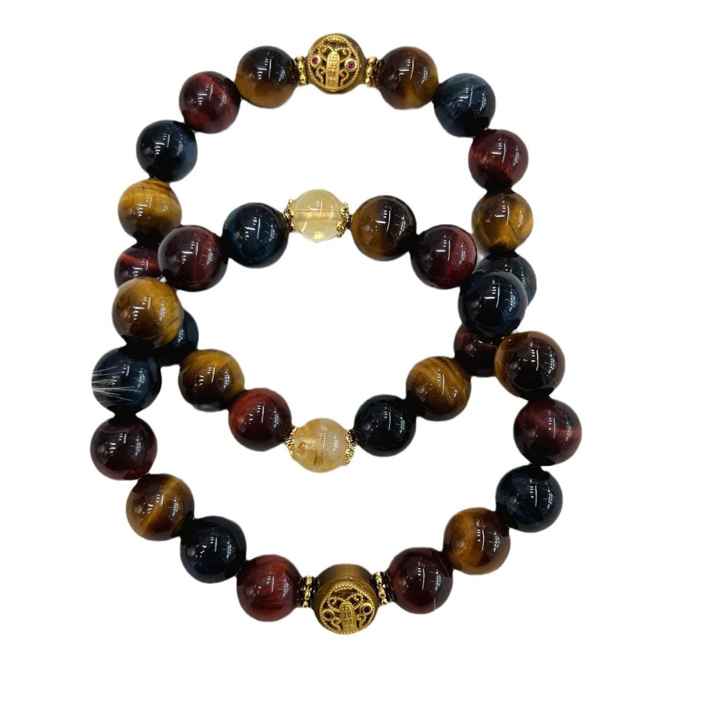 Natural Tiger Eye loose round bead bracelet on Maillard chain showing earthy banded stone patterns