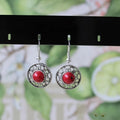 Handmade geometric ethnic earrings in Tibetan silver and turquoise with totem patterns.