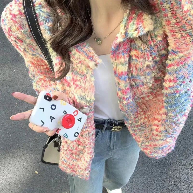A retro-style slim fit knitted cardigan in a soft pink or green colour with a textured toothbrush hair fabric.