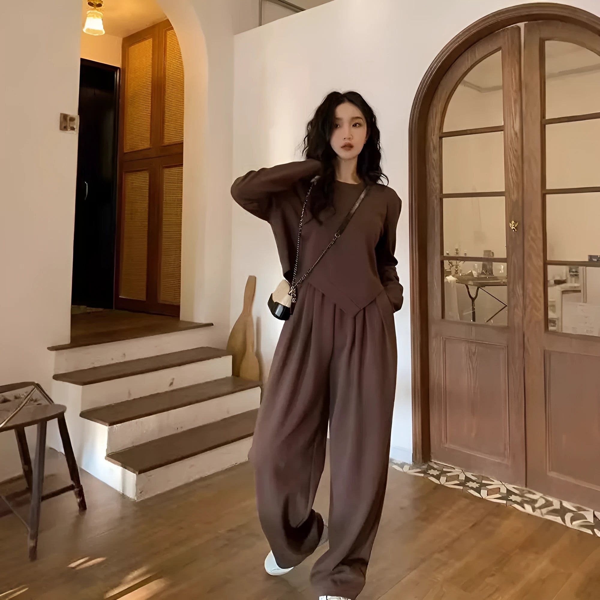Women's khaki loose-fit polyester casual sports suit set with long sleeves and trousers.