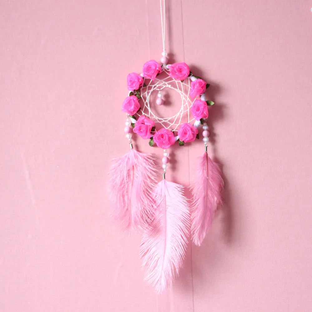 Pink ostrich feather dreamcatcher wind chime ornament measuring 10cm for wall decoration