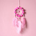 Pink ostrich feather dreamcatcher wind chime ornament measuring 10cm for wall decoration