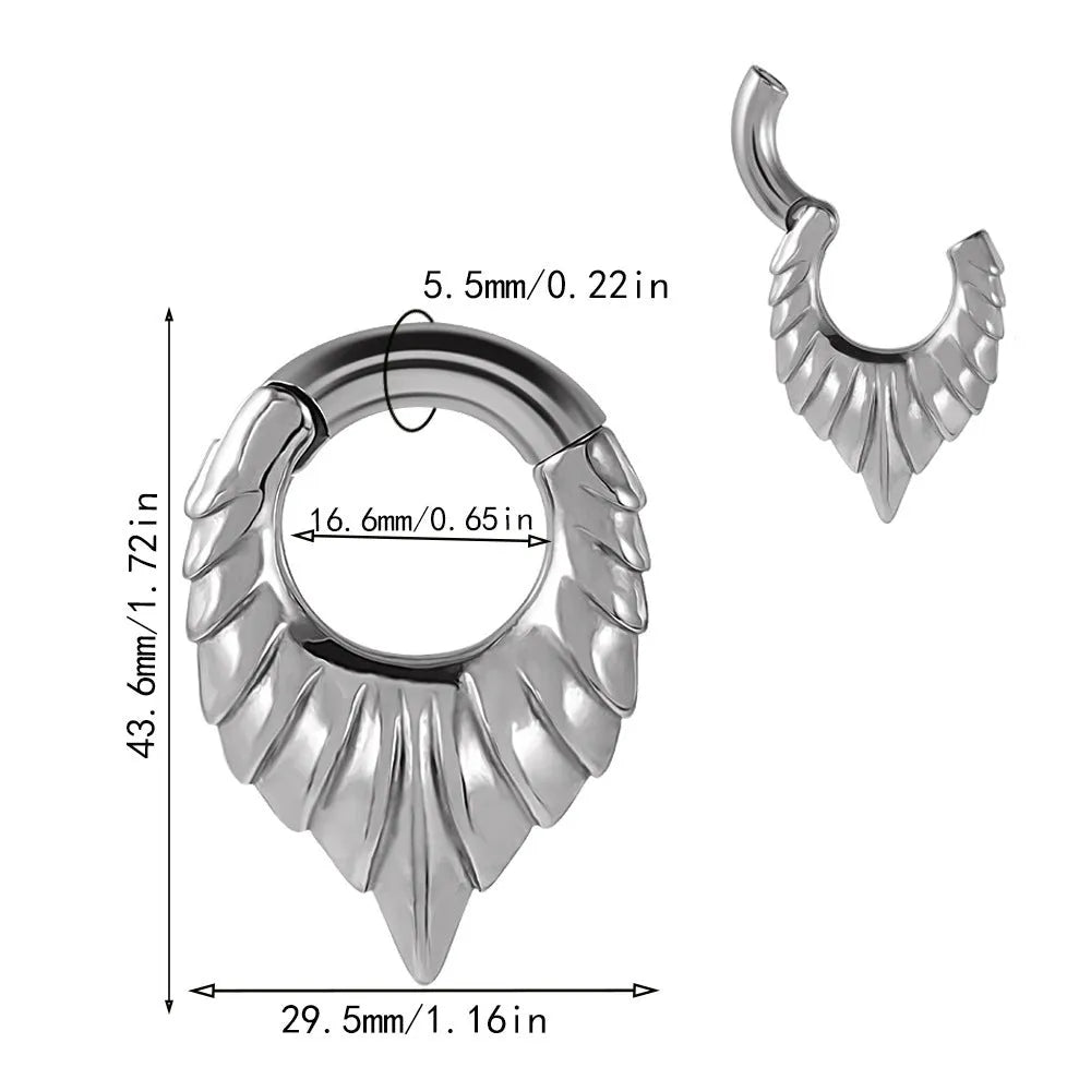 A stainless steel drop-shaped ear extender with totem detailing for 0 gauge stretched earlobes.