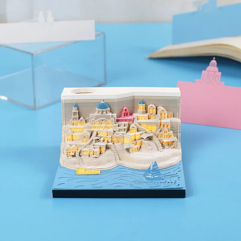 3D paper carving model of Santorini beach with LED lights, made from a notepad
