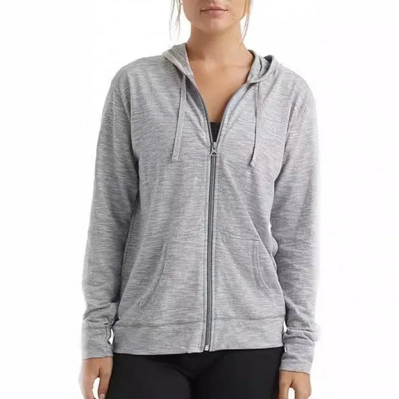 A loose-fit solid colour hoodie pullover with long sleeves shown in multiple colour options.
