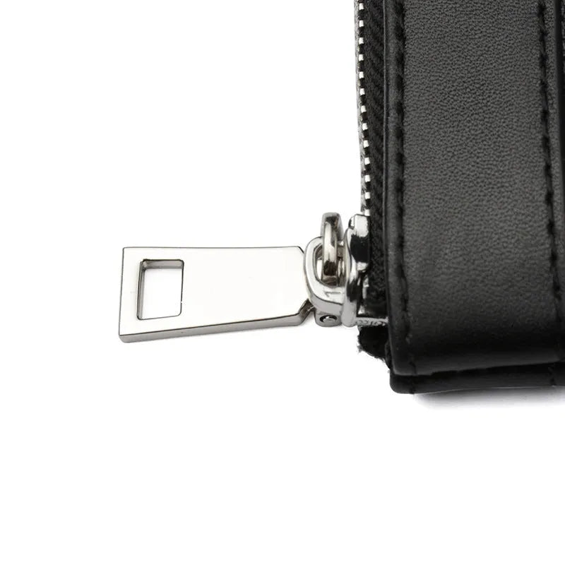 Black plaid clutch style men's leather wallet made from genuine cowhide, shown closed.