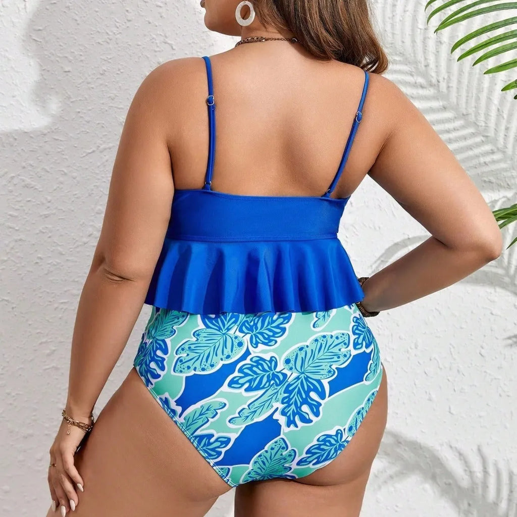 Blue two-piece bikini swimsuit set on a hanger, showing the briefs style and plus-size fit.