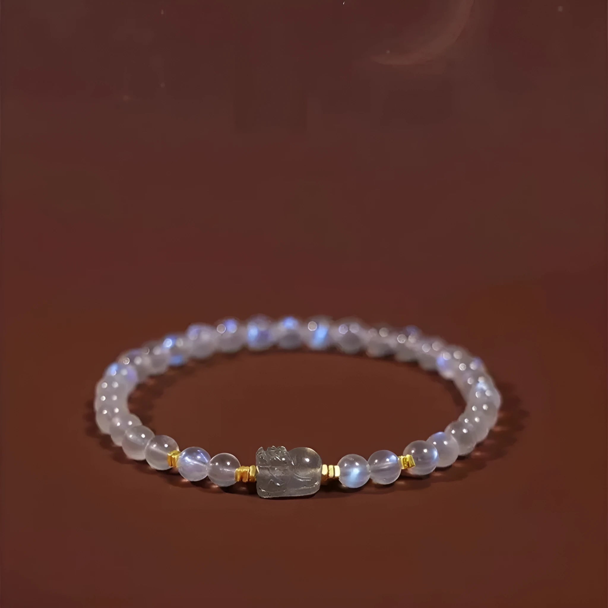 Women's moonstone bracelet with zodiac animal modelling in a national style.