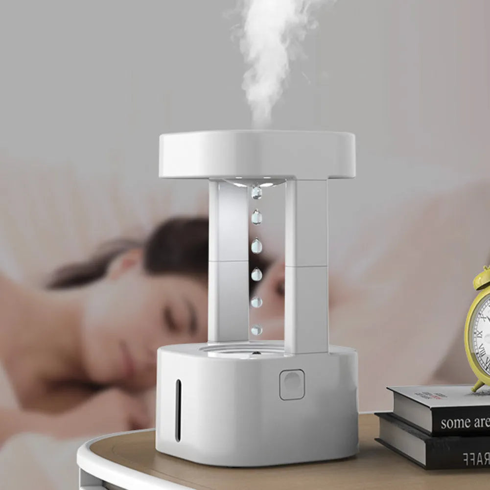 Anti-gravity water drop humidifier with optical illusion water flow and 580ml tank