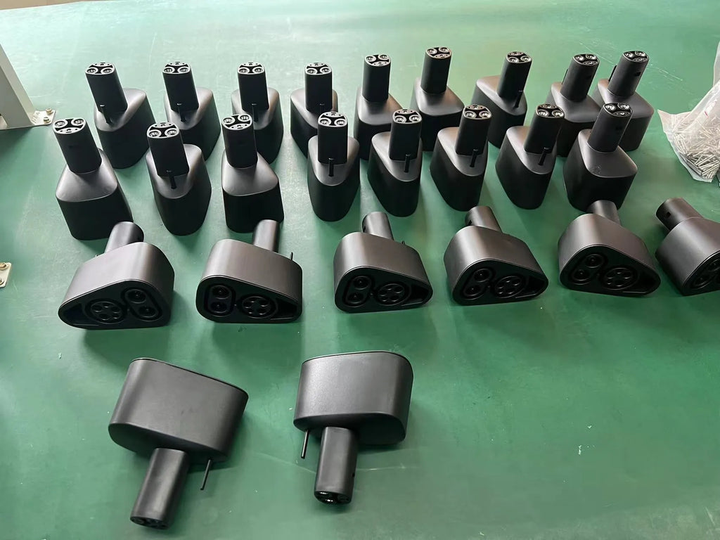 Black Tesla charging plug conversion adapter for American Standard to Tesla compatibility