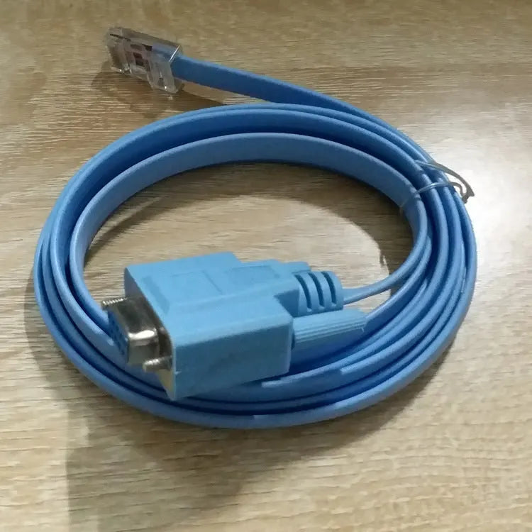 Sky-blue flat RJ45 to DB9 serial console cable with copper conductors, 1.5 metres long
