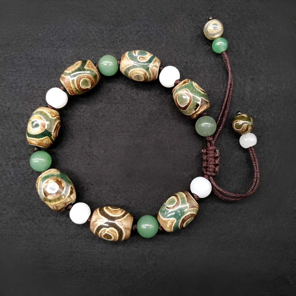 Green agate ethnic bracelet with hand-woven Tibetan beads on black stretch cord