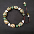 Green agate ethnic bracelet with hand-woven Tibetan beads on black stretch cord
