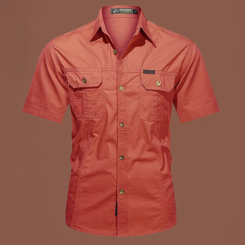 Men's loose beige cotton short sleeve cardigan-style work shirt on a hanger.