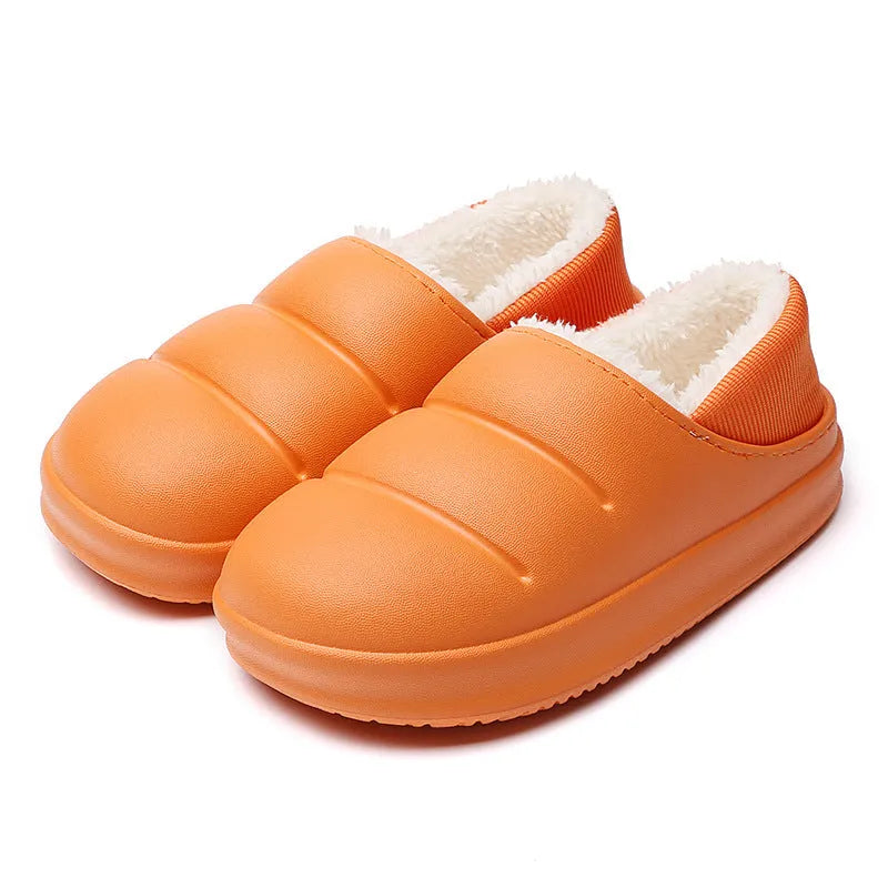 Green waterproof EVA cotton slipper with plush lining, flat sole, and hollow slip-on design.