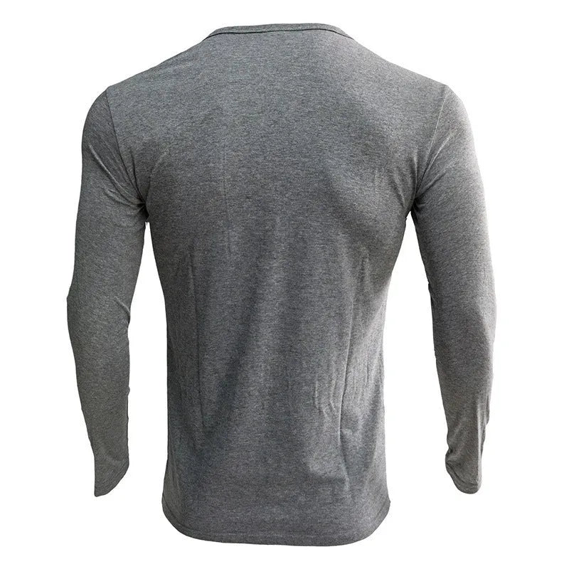 Blue men's long sleeve cotton blend T-shirt with a Henry neck on a hanger.