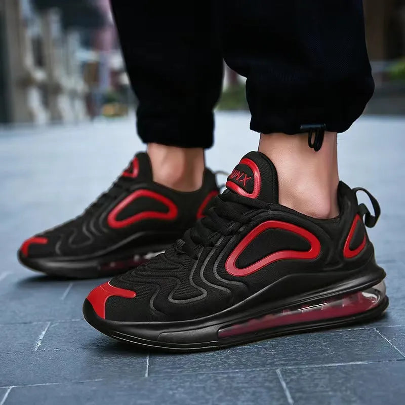 Men's black casual sneakers with lace-up front and thick sole.