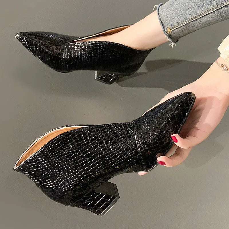 Women's black V cut pointed toe ankle boots with embossed detailing and chunky heel