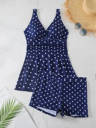 Blue polka dot print women's plus size bikini set with briefs-style shorts.
