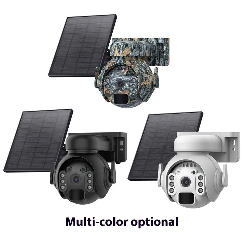 White solar-powered security camera with solar panel on top, mounted on an outdoor wall.